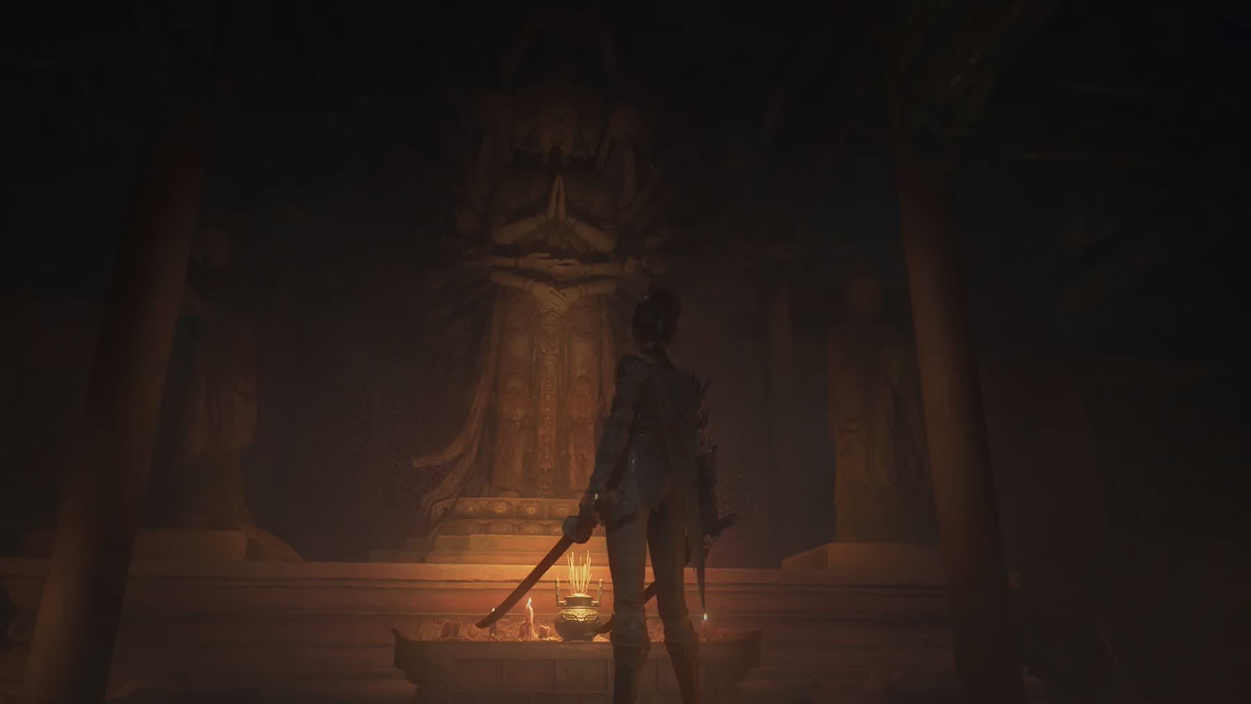 Wuchang: Fallen Feathers gameplay screenshot showing the player character in a dark environment