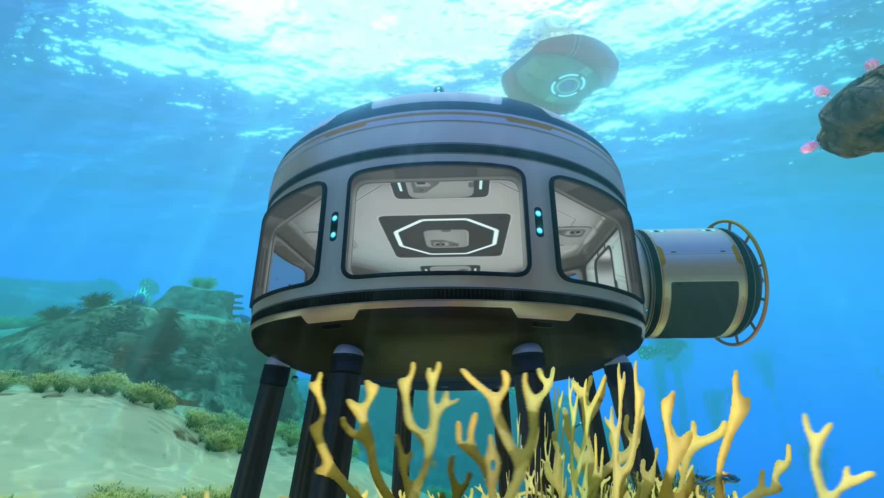 A diver explores a colorful underwater alien biome in Subnautica 2