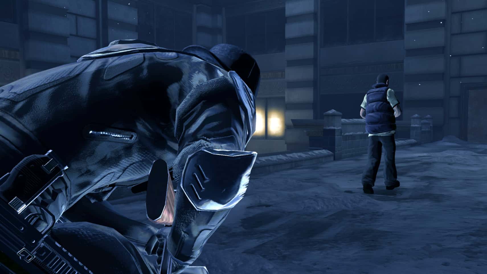 Michael Thorton crouching in a snowy street while stalking a guard in Alpha Protocol