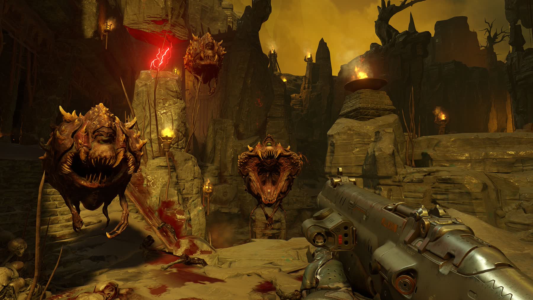 The Doom Slayer battles flying demons in a Hell arena in DOOM 2016