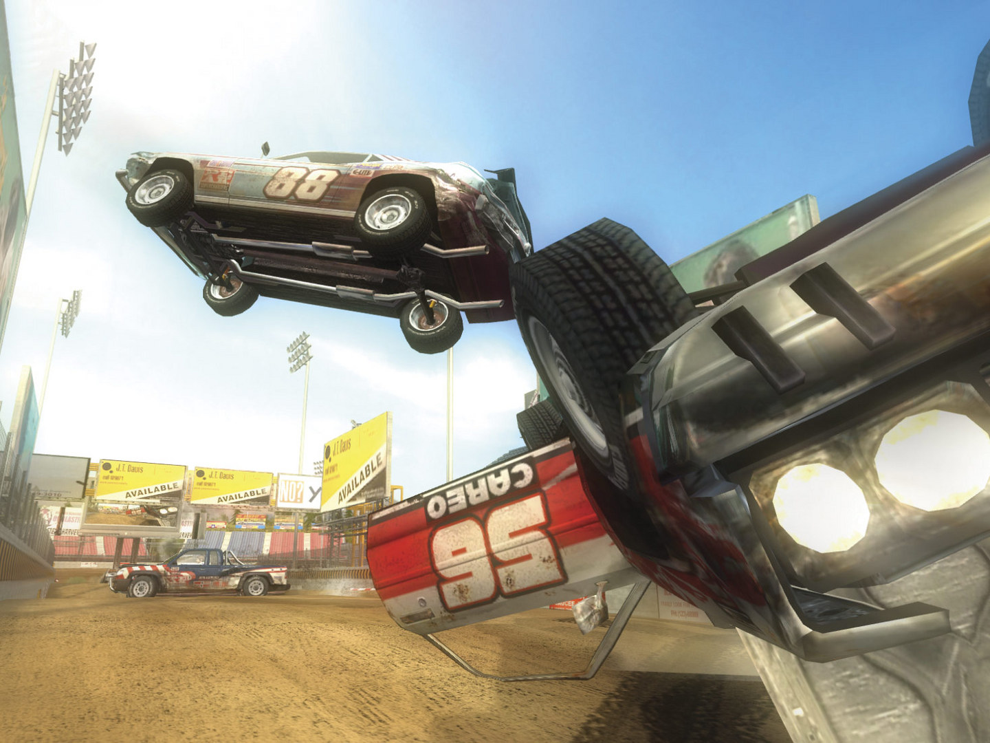 A FlatOut 2 car crashes through trackside debris