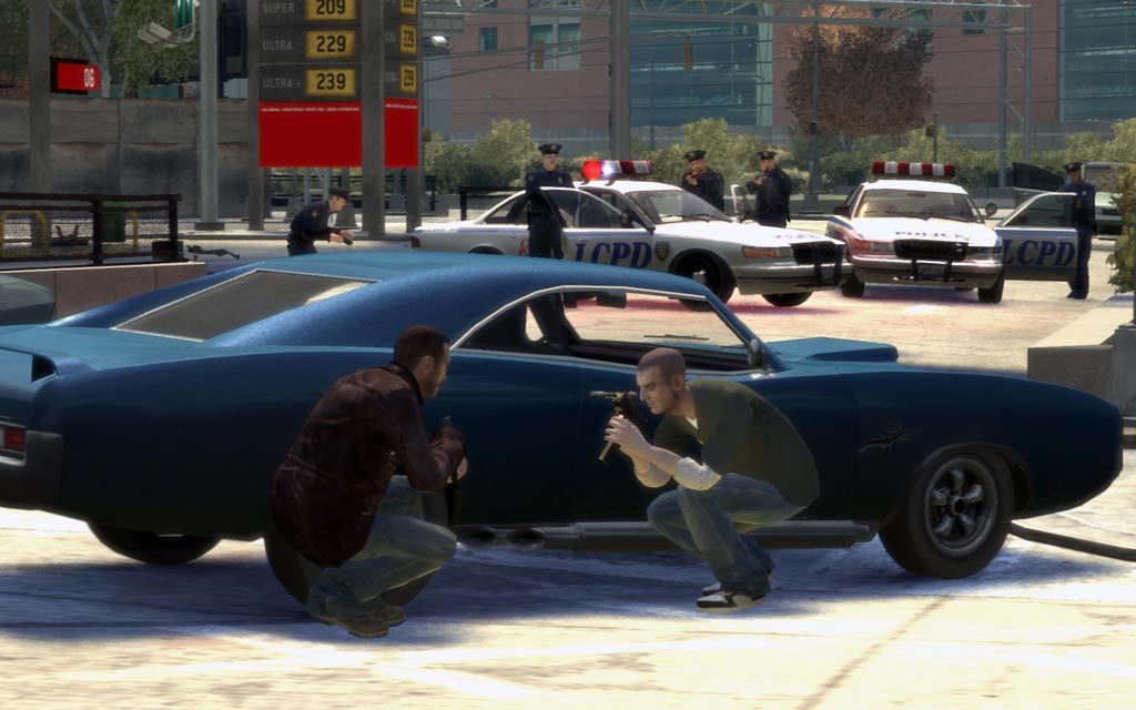 Niko Bellic in a police shootout beside a car in Grand Theft Auto IV