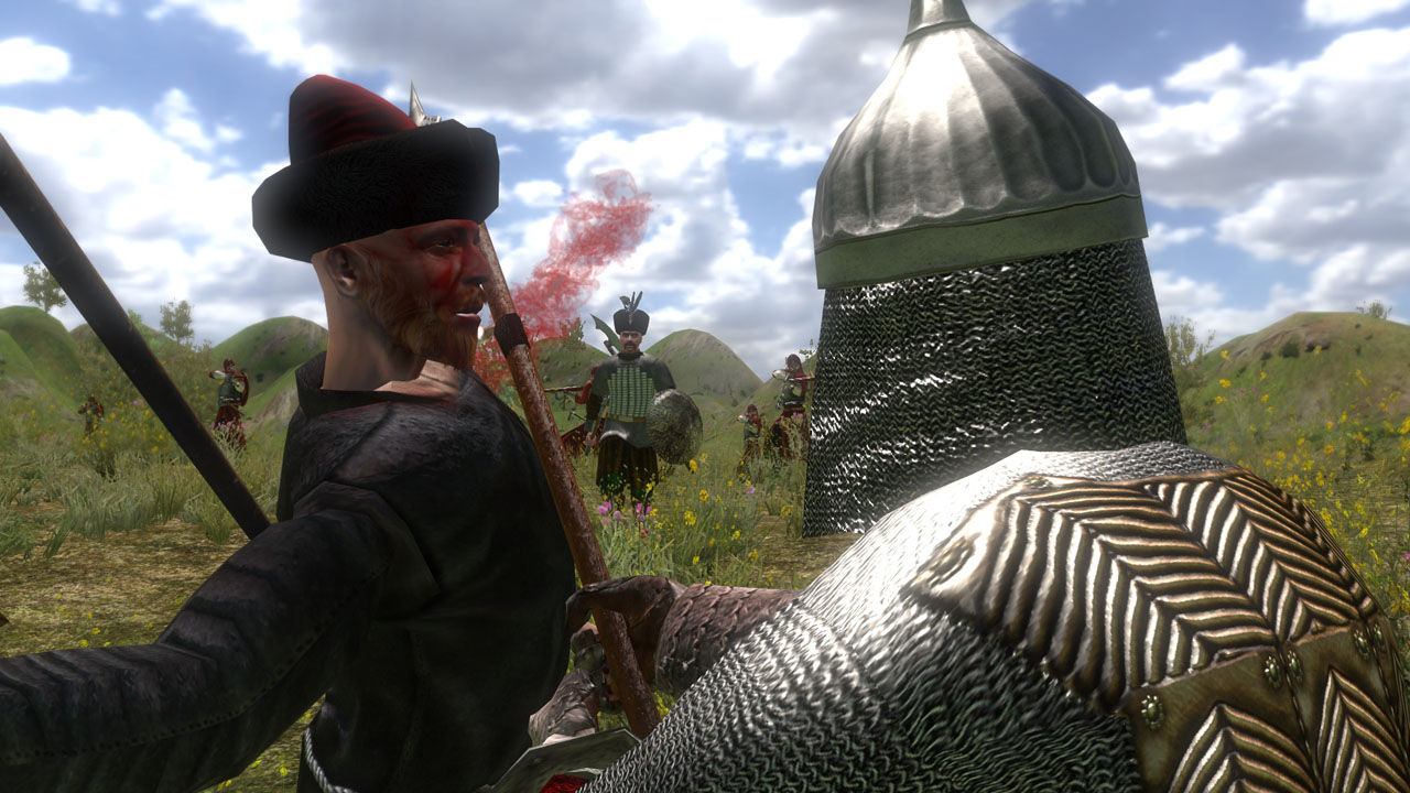 A siege and gunpowder combat scene from Mount & Blade: With Fire & Sword