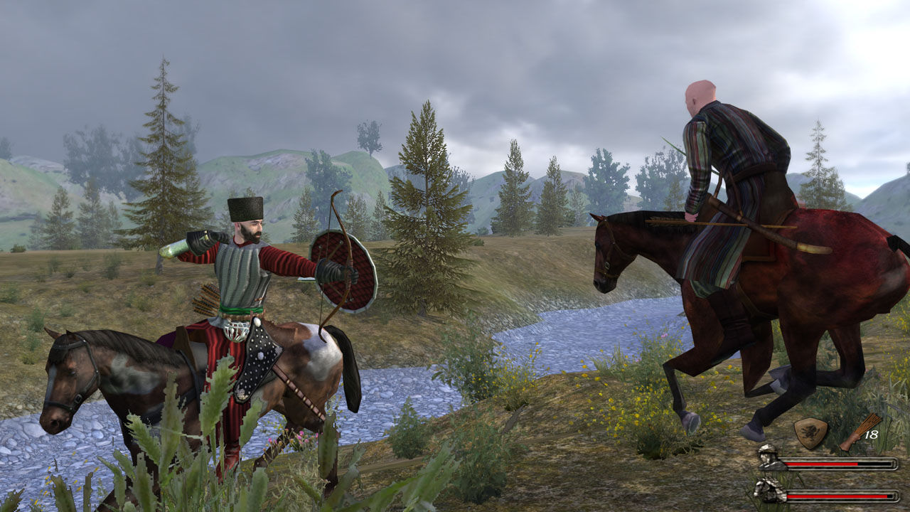 Mounted soldiers charge across a battlefield in Mount & Blade: With Fire & Sword