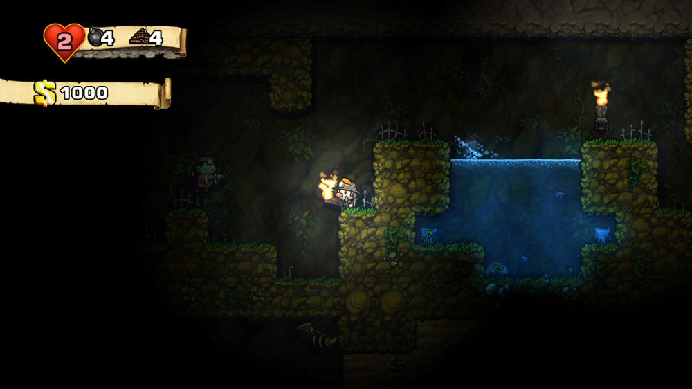 Spelunky dark cave screenshot with torchlight and water