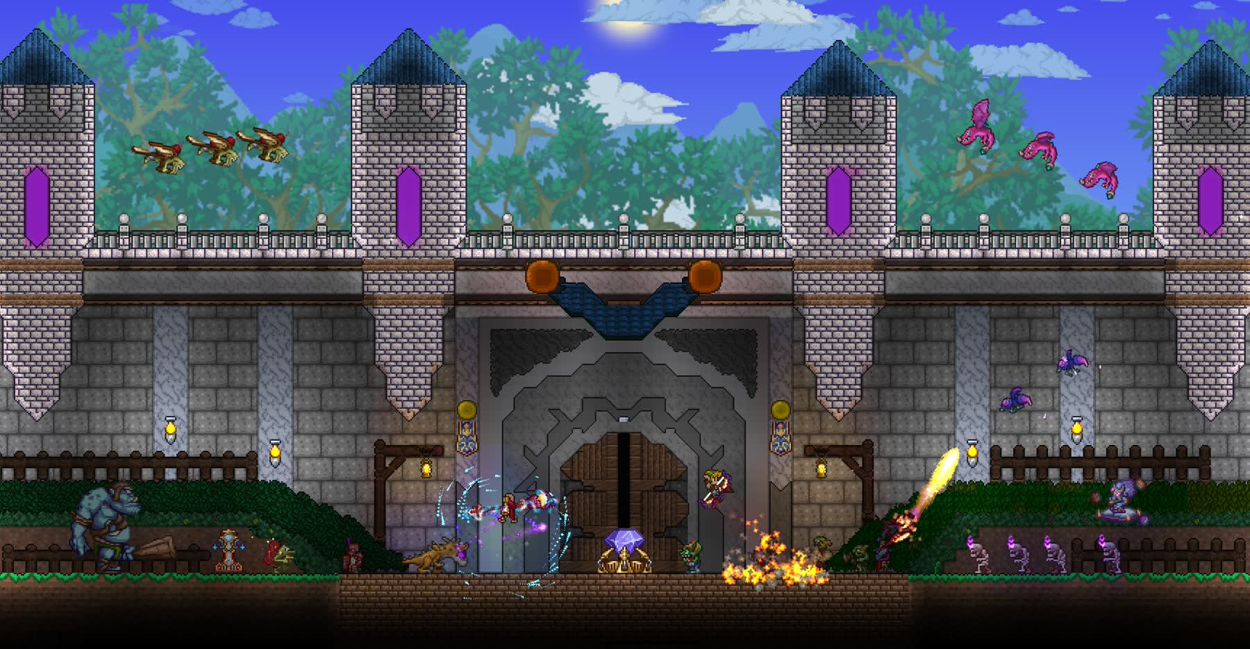 A Terraria player explores an underground cave full of glowing blocks and enemies.