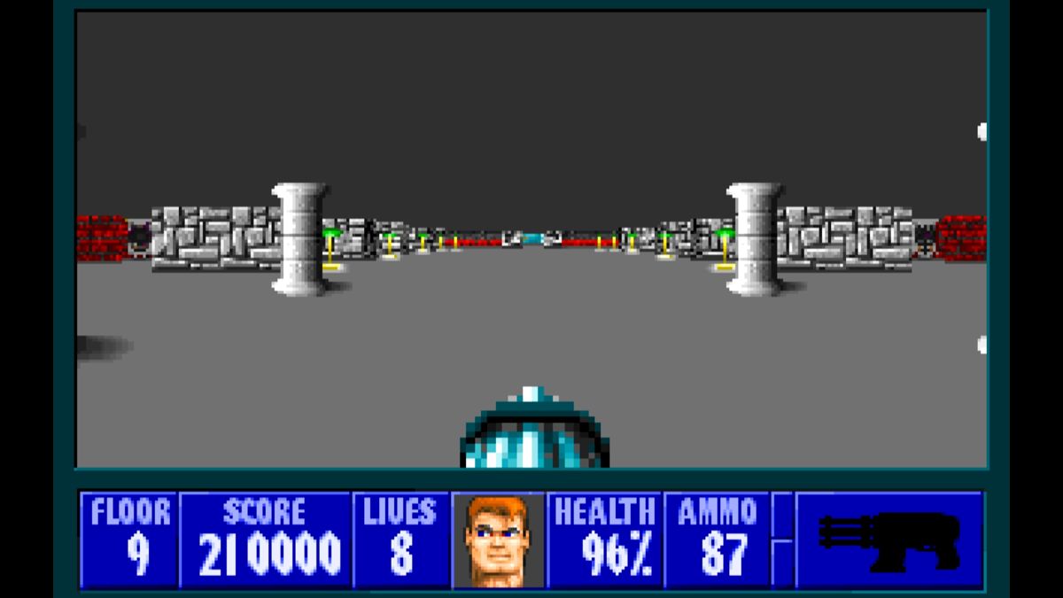 Wolfenstein 3D gameplay showing a large room with stone walls and enemy sprites